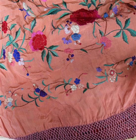 A coral silk Chinese coloured embroidered shawl